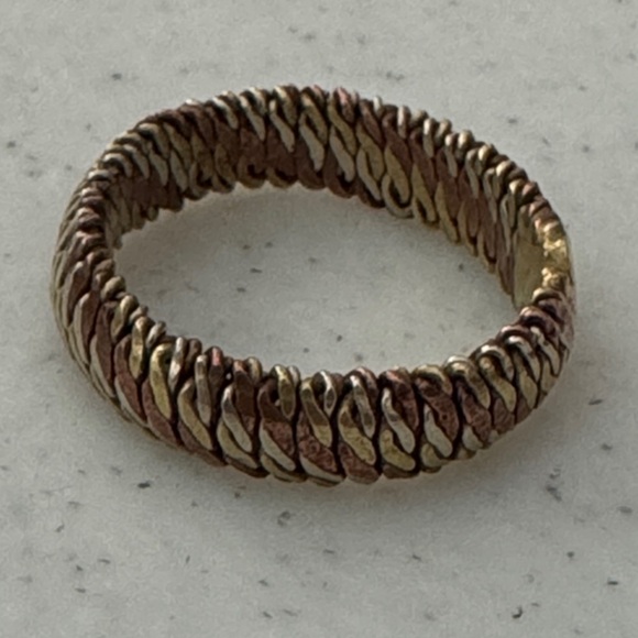 Vintage braided herringbone ring with possible silver gold and copper